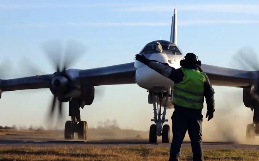 A Tupolev-95 bomber prepares for takeoff in this screenshot from a video a released by Russia’s Ministry of Defense, Tuesday, Oct. 17, 2023. 