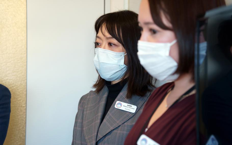 Sachiko Fukada, left, and Nozomi Akiyama are among the linguists who help American civilian patients obtain care at Zama General Hospital near Camp Zama, Japan. 