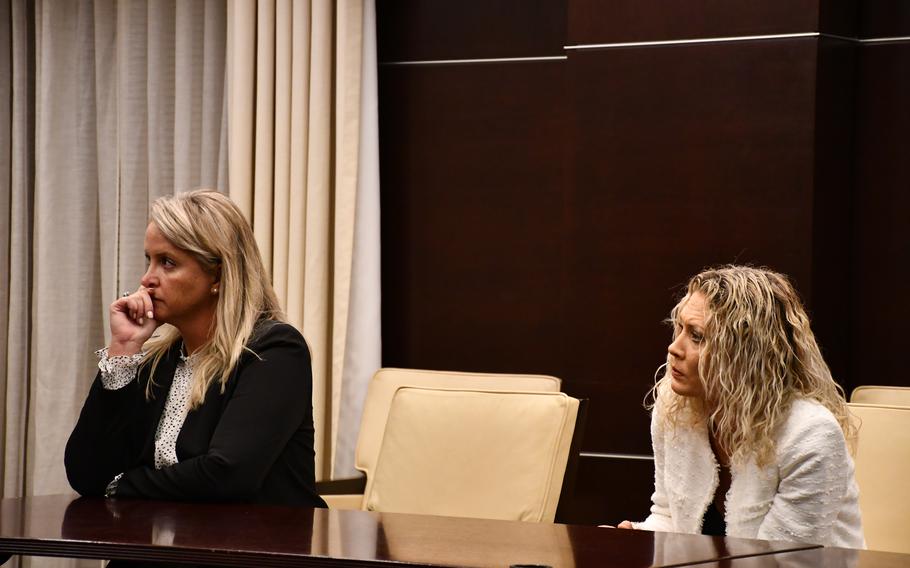 Army Maj. Amanda Feindt, left, and Navy spouse Jamie Simic, right, traveled from Hawaii to Washington, D.C., on Tuesday, February 8, 2022 and urged lawmakers to act on behalf of the service members and families exposed to contaminated water at Joint Base Pearl Harbor-Hickam. Thousands of families were affected when jet fuel leaked into one of three wells the Navy uses for its water distribution system on the Hawaiian island of Oahu. 