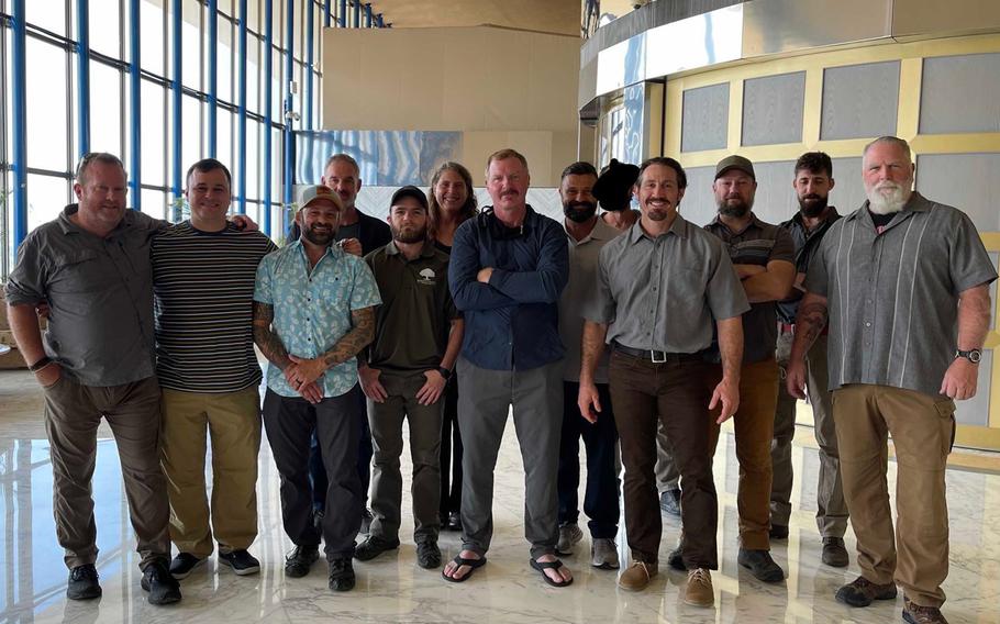 A group of U.S. military veterans and civilian volunteers gathered for an undated photo as part of an effort to evacuate at-risk Afghans. The group helped bring 12,000 people out of Afghanistan, said Nick Palmisciano, an Army infantry officer for six years, adding that they had people based at a hangar at Kabul’s international airport and at the Willard Hotel in Washington, D.C.