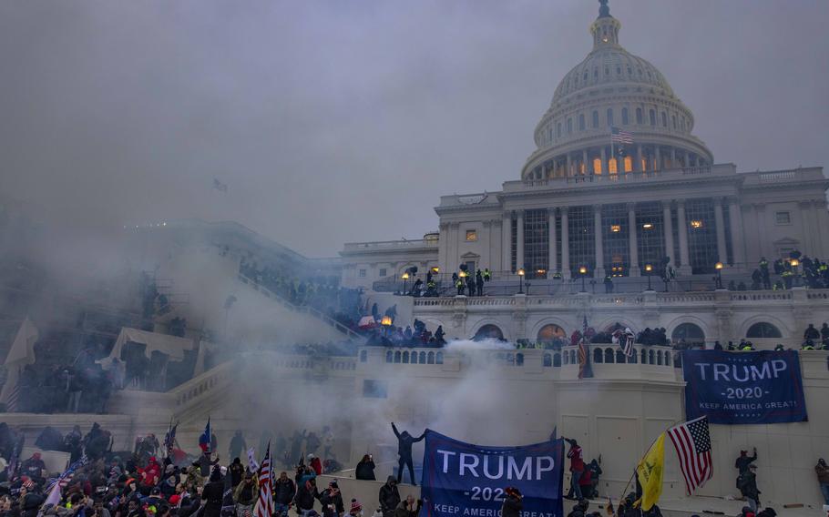 Tear gas is fired at Trump supporters who stormed the Capitol on Jan. 6, 2020.