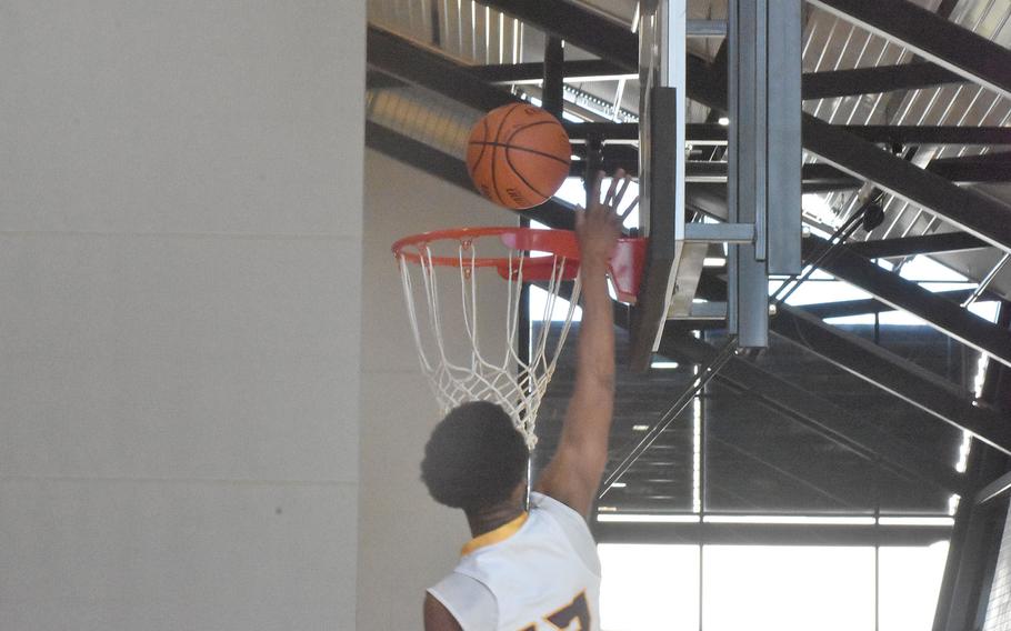 Baumholder's Caleb Pigge' didn't dunk it, but his hand was well above the rim after laying it in on Wednesday, Feb. 23, 2022, at the DODEA-Europe Division III basketball tournament.