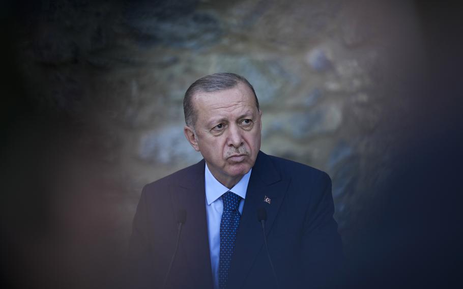 Turkey's President Recep Tayyip Erdogan listens to a question during a joint news conference with German Chancellor Angela Merkel following their meeting at Huber Villa presidential palace, in Istanbul, Turkey, Saturday, Oct. 16, 2021. The leaders discussed Ankara's relationship with Germany and the European Union as well as regional issues including Syria and Afghanistan. (AP Photo/Francisco Seco)