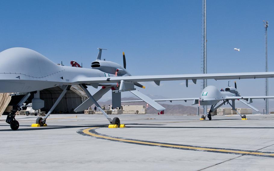 Two freshly assembled Grey Eagle unmanned aerial vehicles sit on the tarmac at Forward Operating Base Shank in Logar Province, Afghanistan, in 2012.