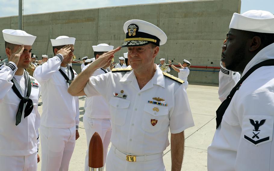 Adm. Stuart Munsch, commander of U.S. Naval Forces Europe and Africa, boards the destroyer USS Bulkeley for a ship tour in Santa Maria, Cape Verde, March 21, 2023. U.S. Naval Forces Europe and Africa and U.S. 6th Fleet are separating staffs after 19 years of being a joint command.