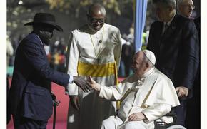 Salva Kiir, the President of South Sudan, welcomes Pope Francis on Saturday, Feb. 4, 2023.