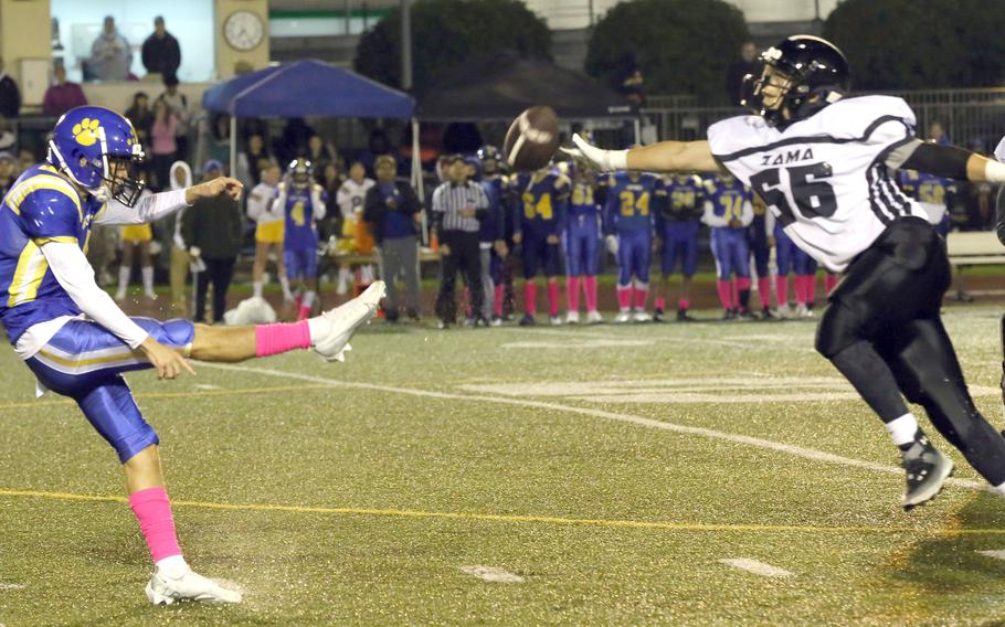 Yokota's Senna Solberg nearly has a punt blocked by Zama's Chris Nagle. Solberg's 22-yard field-goal try in overtime was blocked by Greg Horton.