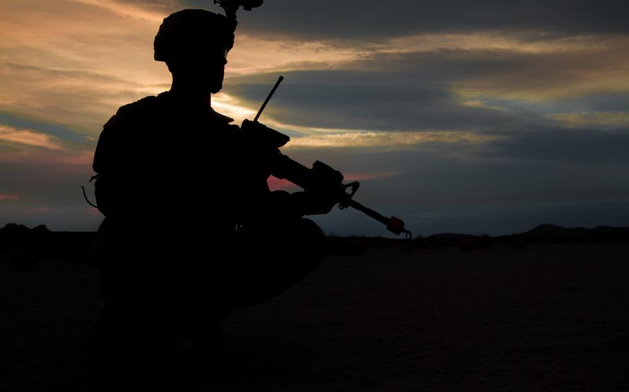 A silhouette of a service member training in May 2013 at Fort Irwin, Calif. 