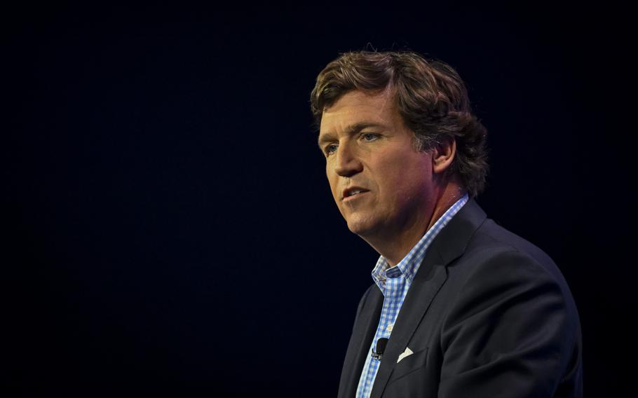 Tucker Carlson says he’ll interview Russian President Vladimir Putin as part of a trip to Moscow.