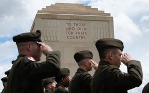 Soldiers with the Army’s 7th Engineer Brigade salute in front of the memorial at the Somme American Cemetery in Bony, France, May 25, 2025.