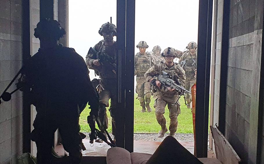 U.S. soldiers test their urban combat skills during an Ulchi Freedom Shield drill in Paju, South Korea, about eight miles from the North Korean border, Wednesday, Aug. 23, 2023. 