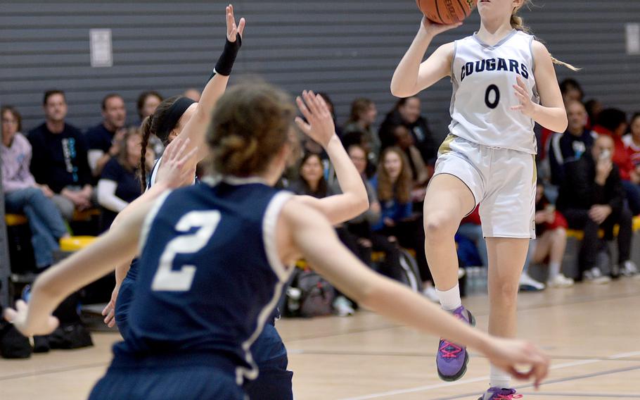 Vicenza's Addie Kropp throws up a runner in a pool-play game against Black Forest Academy during the Division II DODEA European Basketball Championships on Wednesday at Southside Fitness Center on Ramstein Air Base, Germany.