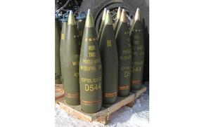 Artillery shells lined up.