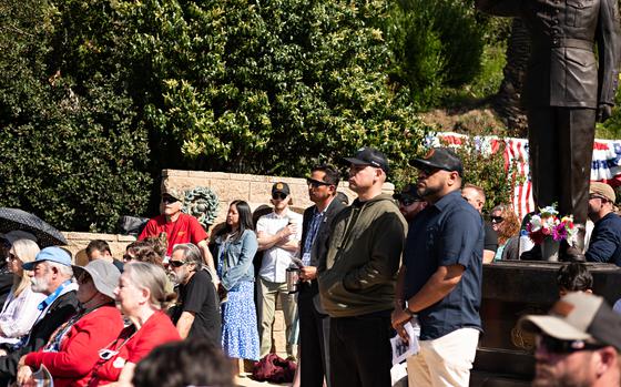 Guests attend the dedication ceremony for the Ramadi Memorial Plaque in Park Semper Fi in San Clemente, Calif., on Saturday, April 6, 2024. The plaque is dedicated to the 33 Marines and one sailor who were killed in the Battle of Ramadi in 2004.