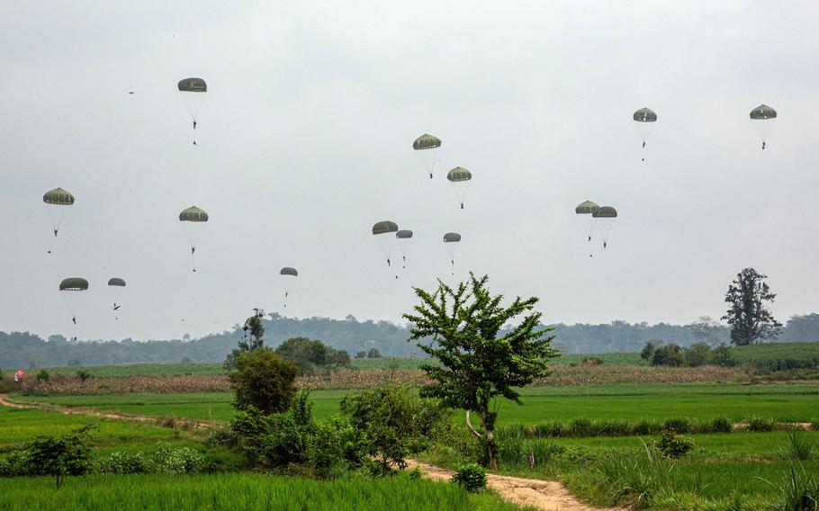 Paratroopers from the United States, Indonesia and Japan team with the 36th Airlift Squadron to practice multinational airborne operations during the Super Garuda Shield exercise in Baturaja, Indonesia, Aug. 3, 2022. 