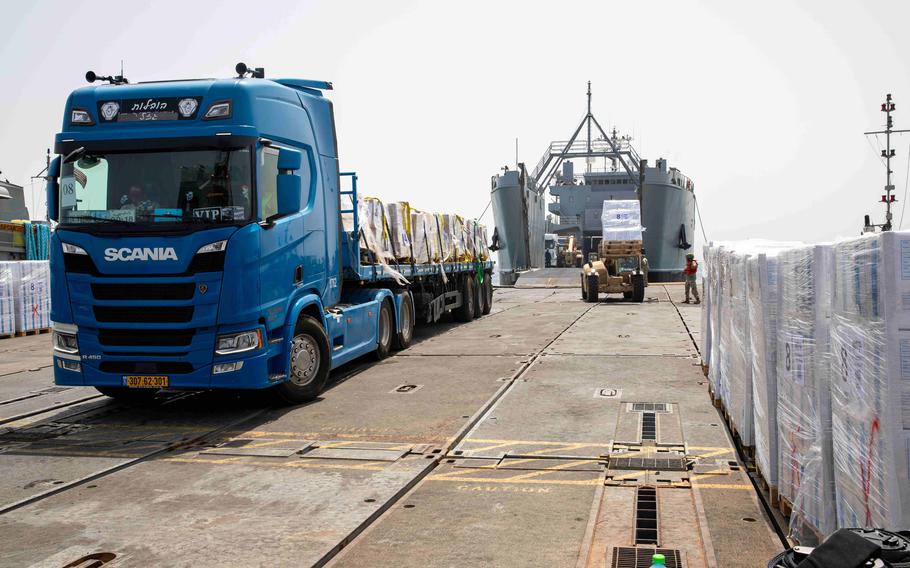 Truck transports humanitarian aid onto U.S. Army vessel on May 20, 2024