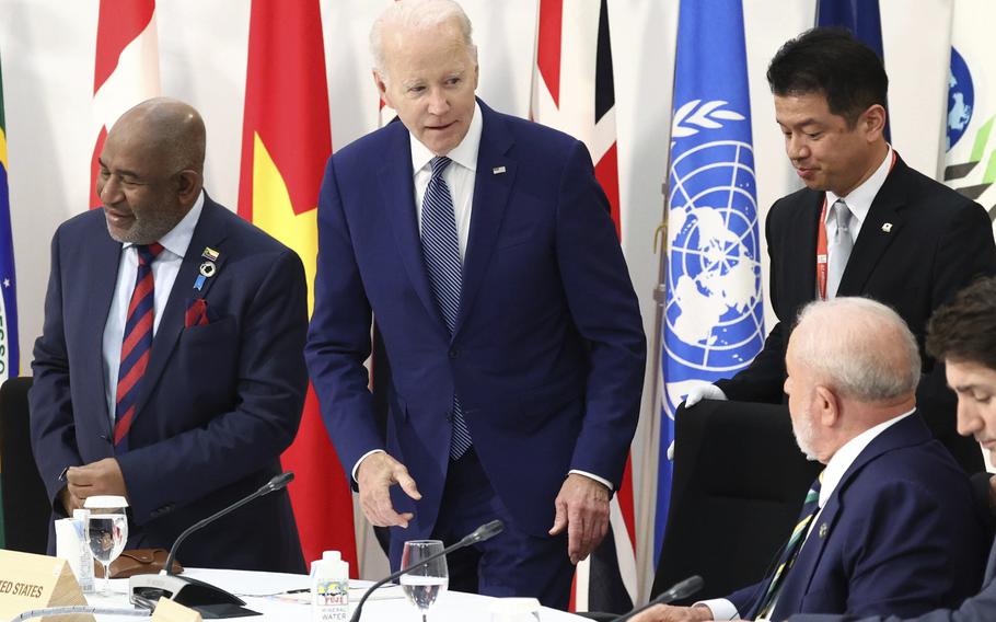 U.S. President Joe Biden, center, attends an outreach session of the leaders of the G7 nations and invited countries,  during the G7 Summit in Hiroshima, western Japan, Saturday, May 20, 2023. 
