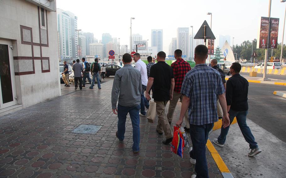 Marines and sailors assigned to the 15th Marine Expeditionary Unit aboard amphibious dock landing ship USS Rushmore explore Abu Dhabi, United Arab Emirates, during a routine port visit, Jan. 28, 2013.