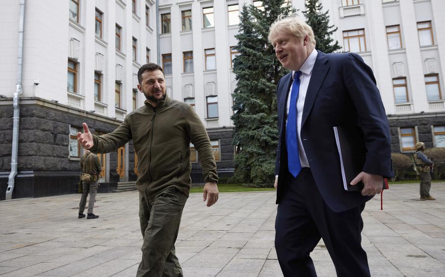 Ukrainian President Volodymyr Zelenskyy, left, welcomes Britain’s Prime Minister Boris Johnson, in Kyiv, Ukraine, Saturday, April 9, 2022. 