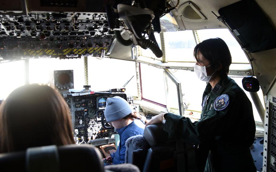 Students get a hands-on lesson on a C-130 airlifter during the second-annual Fly Girls event at Yokota Air Base, Japan, Wednesday, March 8, 2023.