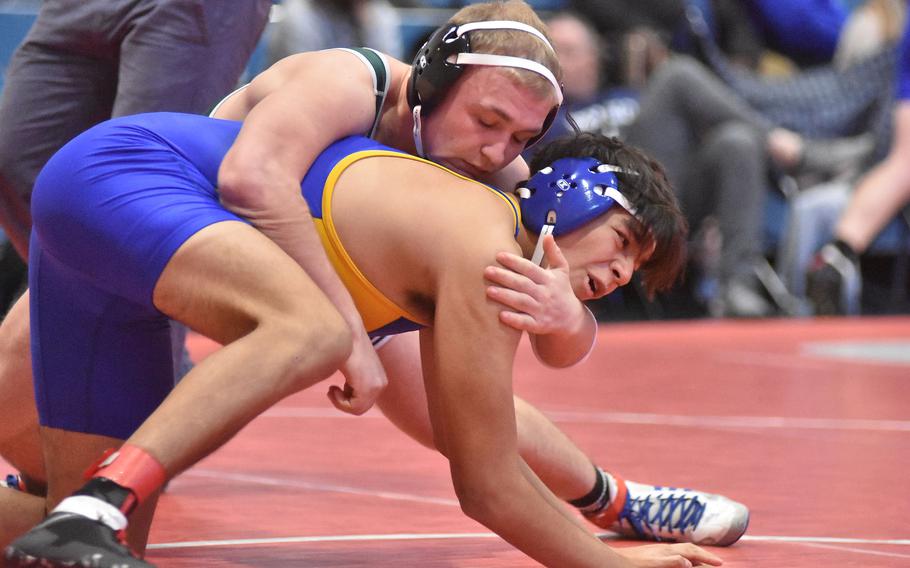 Naples' Matteo Toliver controls Sigonella's Isaac Amaro in a 175-pound match Saturday, Feb. 4, 2023, at the DODEA-Europe Southern Europe regional at Aviano Air Base, Italy. Toliver won.
