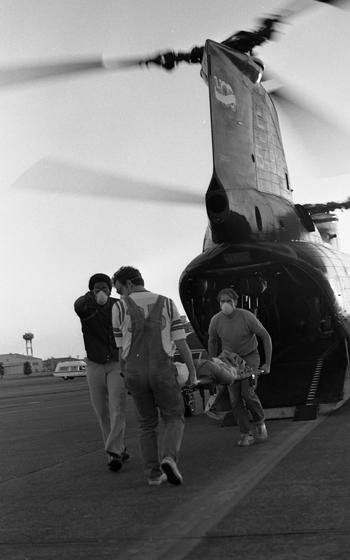 A victim on a stretcher.