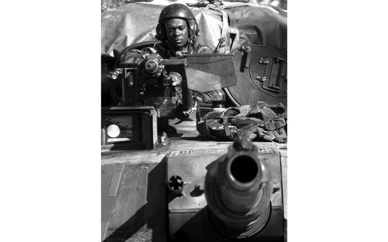 Bosnia, February, 1996: Pvt. 2 Reggie Ficklin of Company C, 2nd Battalion, 68th Armored Regiment, out of Baumholder, Germany, mans the turret of an M1A1 Abrams tank at Checkpoint 52, south of Olovo, Bosnia and Herzegovina, on IFOR's Route Python.

Looking for Stars and Stripes’ historic coverage? Subscribe to Stars and Stripes’ historic newspaper archive! We have digitized our 1948-1999 European and Pacific editions, as well as several of our WWII editions and made them available online through https://starsandstripes.newspaperarchive.com/

META TAGS: U.S. Army; Yugoslavia; Bosnia and Herzegovina; IFOR; Operation Joint Endeavour