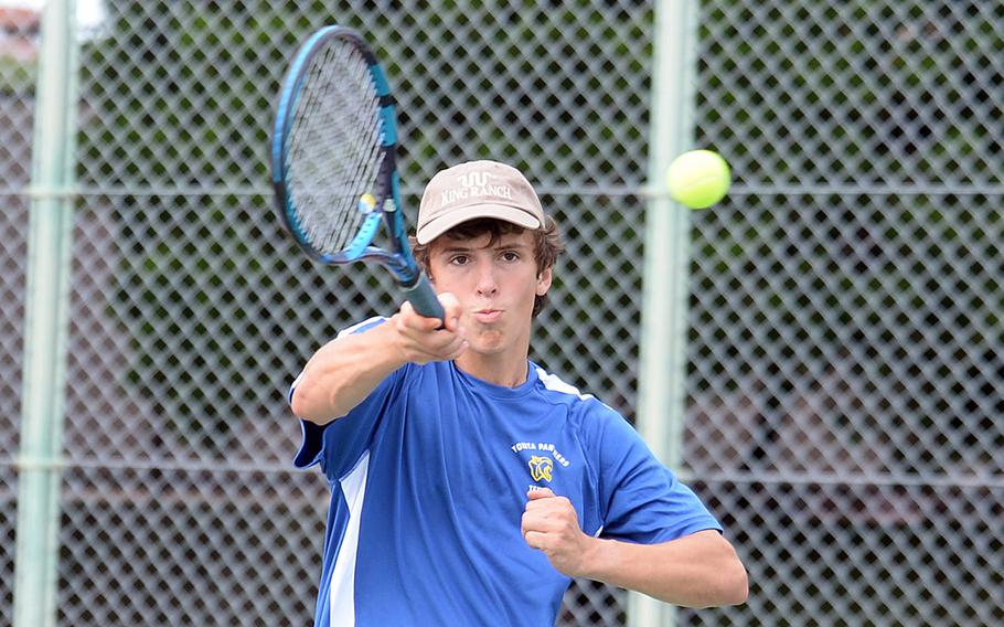 Yokota's Will Rhyne slaps a forehand return during his 6-1 singles victory over Matthew C. Perry's Jalen Cobb on Saturday.