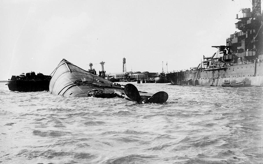 View of the capsized U.S. Navy battleship USS Oklahoma at Pearl Harbor on Dec. 7 1941.