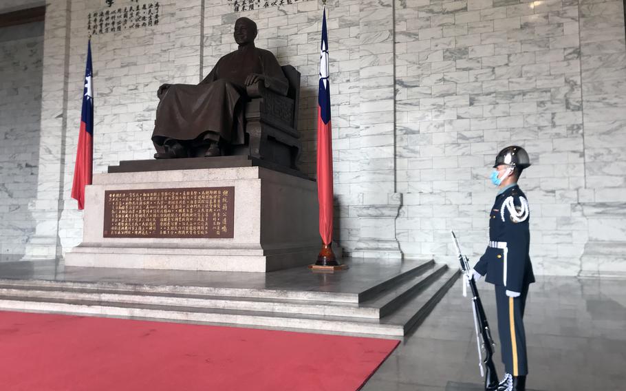 A soldier stands guard at the National Chiang Kai-shek Memorial in Taipei on Jan. 15, 2023. 