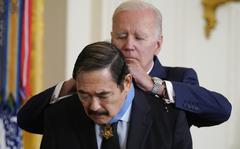 President Joe Biden awards the Medal of Honor to Spc. Dennis Fujii for his actions on Feb. 18-22 1971, during the Vietnam War, during a ceremony in the East Room of the White House, Tuesday, July 5, 2022, in Washington. 