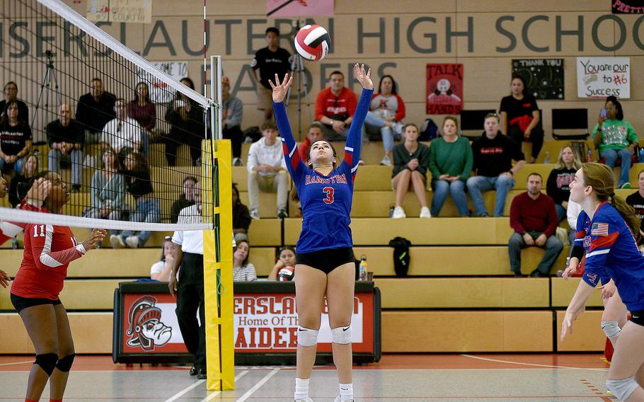 Ramstein's Jazzmyn Hall sets for a teammate's attack during an Oct. 6, 2023, match against the Raiders at Kaiserslautern High School in Kaiserslautern, Germany.