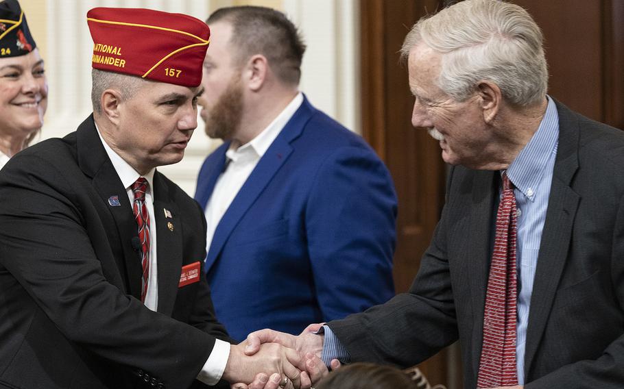 American Legion National Commander Daniel Seehafer shakes hands with Sen. Angus King, I-Maine, before a joint Senate and House Veterans’ Affairs committees hearing on Capitol Hill on Wednesday, March 13, 2024.