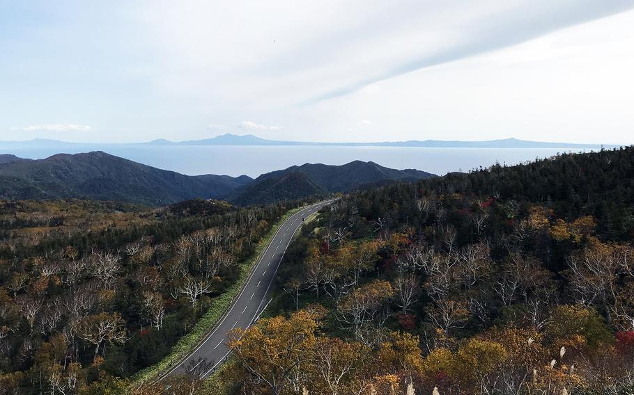 Russia-controlled Kunashiri Island is seen in the distance from the Shiretoko Peninsula in Hokkaido, Japan, Oct. 10, 2018.