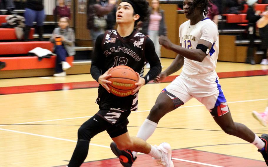 Kameron Ross drives to the basket.