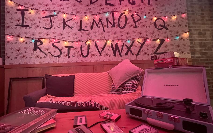 At Stranger Pronto, a “Stranger Things”-themed cafe in Tokyo, guests can pose for photos in a replica of the Byers’ living room. 