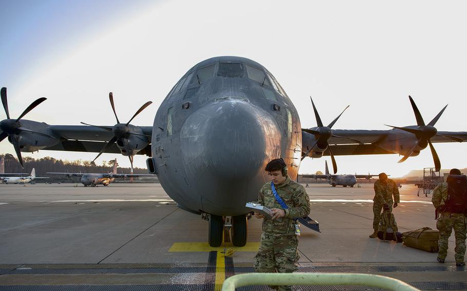 U.S. airman review a checklist before loading cargo and passengers to a C-130J Super Hercules aircraft at Ramstein Air Base, Germany, Feb. 9, 2023. The aircraft delivered airmen of various specialties to Incirlik Air Base, Turkey, to provide aid following the 7.8 earthquake that struck Turkey and Syria on Feb. 6.