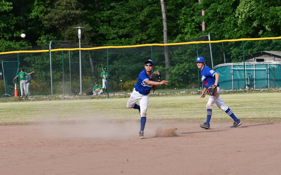 Ramstein second baseman Donovan Kaya fields a ground ball and throws to first against the Vilseck Falcons in the team’s second game of the 2022 DODEA-Europe baseball championships.