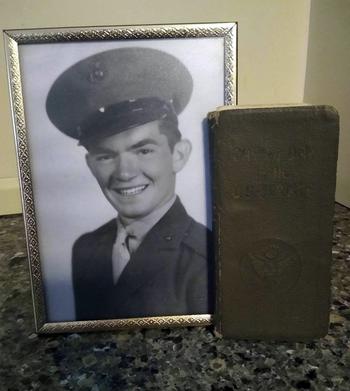 The wartime diary of Marine Sgt. Leo “Bull” McDermott sits on the mantel of his daughter’s home in Fairhaven, Mass., Aug. 8, 2023.