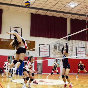 Nile C. Kinnick's Mikaila Joi Miranda goes up to spike against Seisen's Lisa Purcell during Tuesday's Kanto Plain volleyball match. The Phoenix won in five sets.