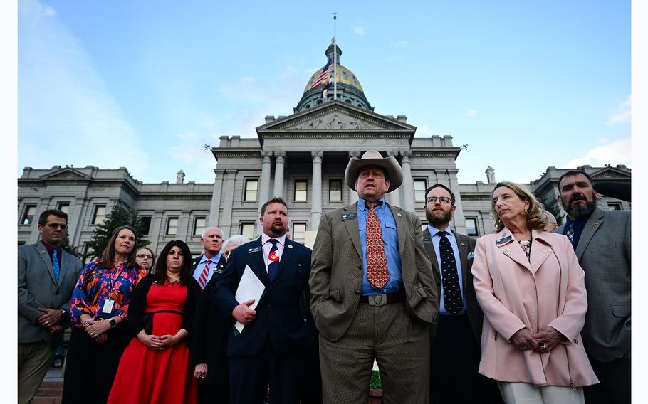 Republican Minority Leader Mike Lynch, in cowboy hat, joins other Republican Representatives during a protest event on the West steps of the Colorado State Capitol on May 8, 2023 in Denver, Colorado.  