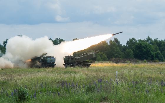 High Mobility Artillery Rocket System (HIMARS) vehicles participating in Saber Strike 17 execute a fire mission in Poland, June 16, 2017.  The United States began in June to supply Ukraine with HIMARS, which can launch multiple rockets with precision at Russian military targets from nearly 50 miles away. Russian cargo planes have quietly picked up the first of scores of Iranian-made combat drones for use against Ukraine.