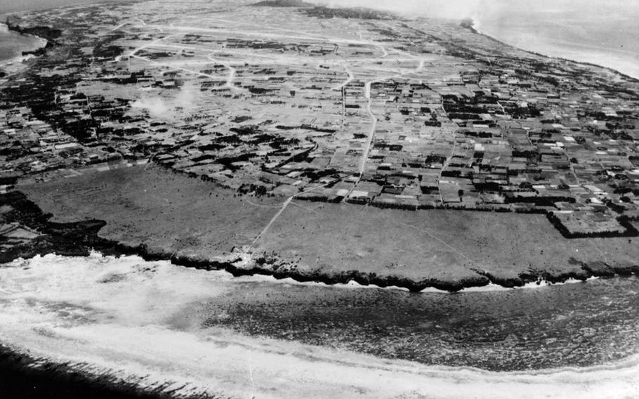 Smoke rises from Iejima, Okinawa, April 15, 1945, following a naval bombardment. U.S. troops landed on the island the next day. 