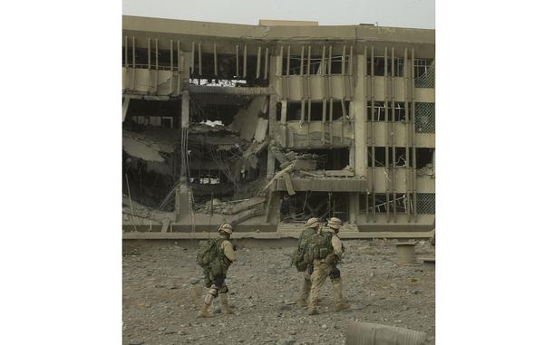 Hed: What's left, 2003

Baghdad, Iraq, Apr. 9, 2003: Marines walk among the runs of the Special Republican Guard Headquarters buildings in Baghdad.  Golf Company, 2nd Battalion, 23rd Marines entered the compound on April 9, leading the push into Baghdad for their battalion.

META TAGS: Operation Iraqi Freedom; Wars on Terror; USMC; US Marine Corps; Marines