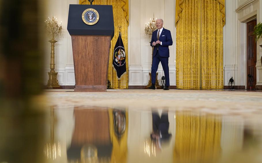 President Joe Biden arrives to speaks at a news conference in the East Room of the White House in Washington, Wednesday, Jan. 19, 2022. 