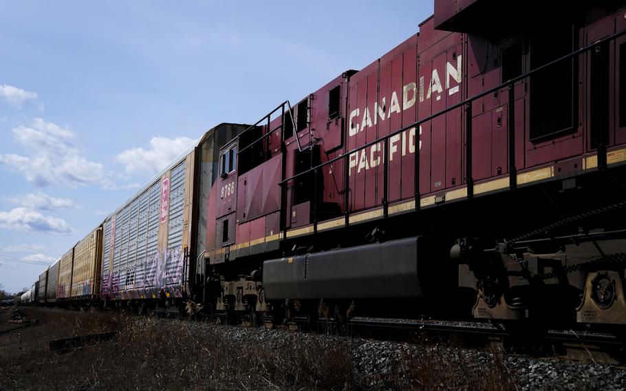 Canadian Pacific trains sit at the main CP Rail train yard in Toronto, March 21, 2022. The first major railroad merger since the 1990s could be approved Wednesday, March 15, 2023, when federal regulators announce their decision on Canadian Pacific’s $31 billion acquisition of Kansas City Southern railroad. 
