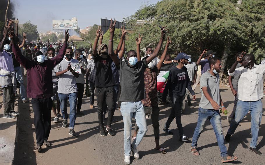 Sudanese protest against the military takeover, which upended the country’s fragile transition to democracy, in Khartoum, Sudan, Sunday, Nov. 21, 2021. Sudan’s military and civilian leaders signed a deal Sunday to reinstate Prime Minister Abdalla Hamdok, who was deposed in a coup last month.