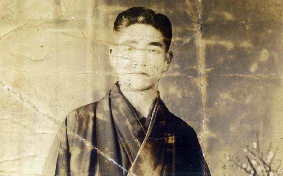 A bespectacled man appears in one of five photographs that were sent home from the Marshall Islands by a U.S. Marine during World War II. 