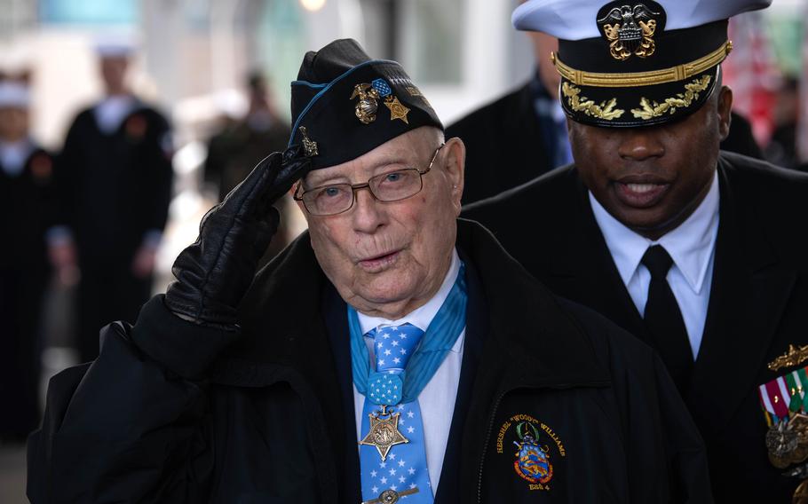 Medal of Honor recipient Hershel Woodrow Williams salutes as he is introduced at the USS Hershel "Woody" Williams commissioning ceremony, March 7, 2020, in Norfolk, Va. 