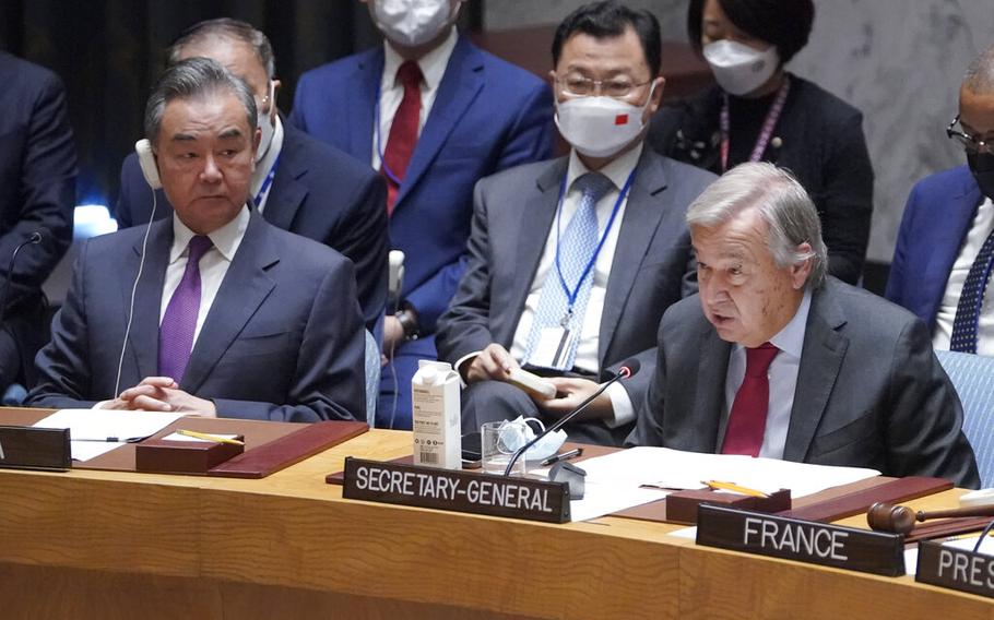 China’s Foreign Minister Wang Yi, left, listens as United Nations Secretary-General Antonio Guterres speaks during high level Security Council meeting on the situation in Ukraine, Thursday, Sept. 22, 2022 at United Nations headquarters.